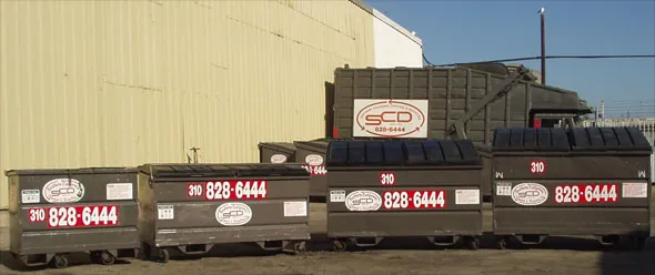 SCD bins lined up by size: 1, 1.5, 2 and 3 cubic yards